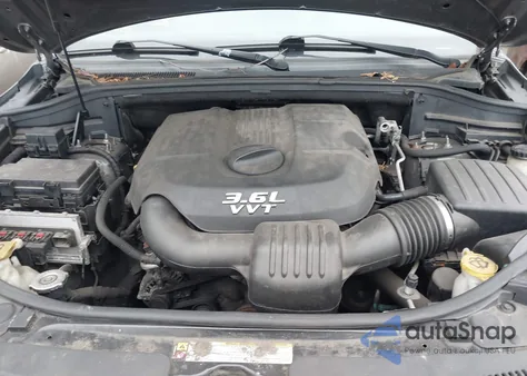 2013 Jeep Grand Cherokee Overland z USA, uszkodzony, nr VIN 1C4RJECG2DC595903